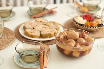 Bowl of traditional Vietnamese braised pork with eggs served for Tet family dinner