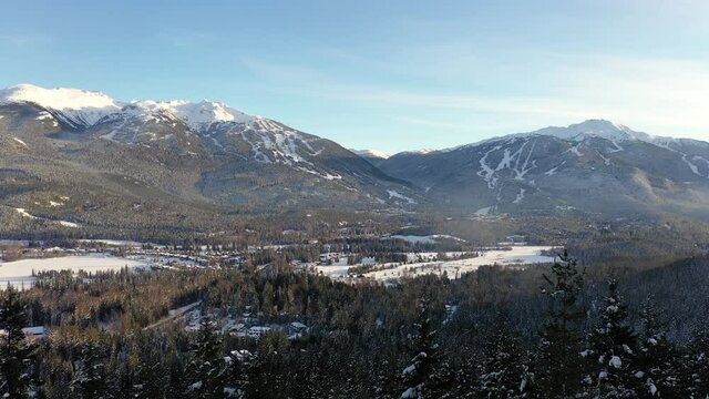 snow covered ski resort and mountains