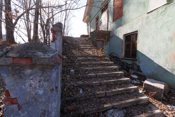 Fototapeta na wymiar broken staircase next to the building