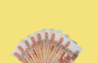 5000 russian rubles, money background top view, banknotes isolated on colored background