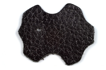 A sample of genuine leather on a white background.
