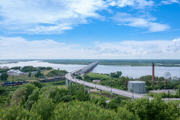 Khabarovsk, Russia, July 8, 2021: Bridge over the Amur River summer landscape