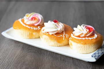 Vanilla Cake with Orange Cream Topping