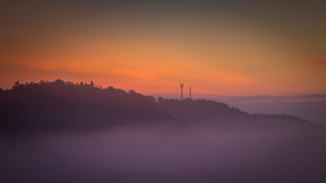 Landscape in the morning fog at dawn. sunrise. sun rays at dawn.