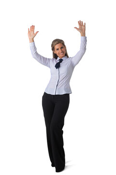 Business woman raising her arms in joy