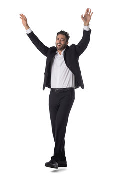 Happy businessman with arms up