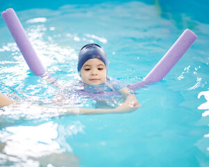 Fototapeta na wymiar Kid swimming activity