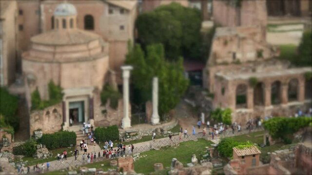 People Visiting The Famous Temple Of The Divine Romulus In The Roman Forum, Rome, Italy. selective focus, time lapse