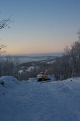 frosty nature landscape with trees, sky and sun