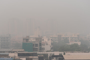 Air pollution over houses and apartment in the Indian city of Gurgaon. Poor air quality index...