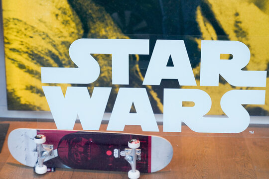 star wars logo brand and text sign on windows facade shop exhibition skateboard branding movies