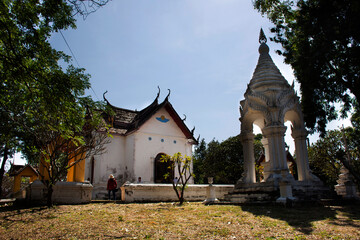 Ancient ruins antique church building of Wat Prasat Nakhon Luang Temple  for thai people and foreign travelers travel visit respect praying Buddha god deity angel in Phra Nakhon Si Ayutthaya, Thailand