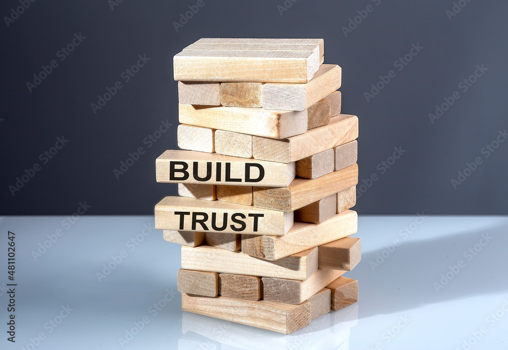 Poster the text on wooden blocks build trust