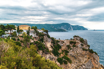 Buildings standing on high hill above Mediterranean sea