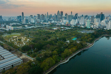 Fototapeta premium Aerial view of Bangkok city night view at Benjakitti Park, Bangkok, Thailand 