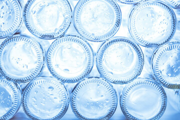 Empty glass bottles ready for recycling