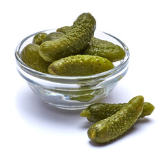 Bowl of Tasty canned Whole green cornichons isolated on a white background