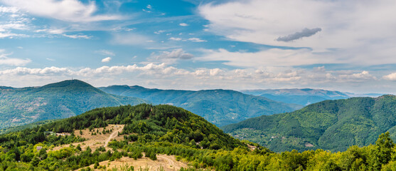 Fototapeta na wymiar Summer panoramic mountain landscape, Sofia Mountain in the area of the village of Lukovo, share of the Western Stara Planina (Balkan Mountain), Bulgaria.
