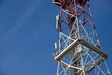 Telecommunications antenna for radio, television and telephony whit cloud and Blue sky