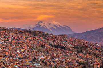 Panorama of the city of La Paz with mountain of Illimani on the background. Bolivia.