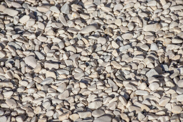 small bright pebbles and gravel as background or texture