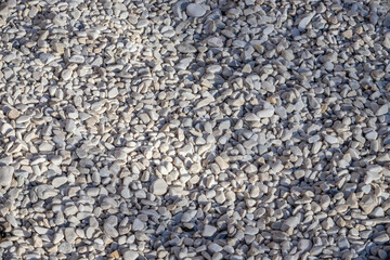 small bright pebbles and gravel as background or texture