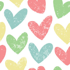 Seamless pattern with hearts in pastel colors.