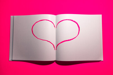  Notebook with white blank pages for notes on a yellow background. High quality photo