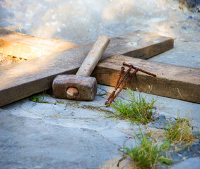 Wooden cross and iron nails