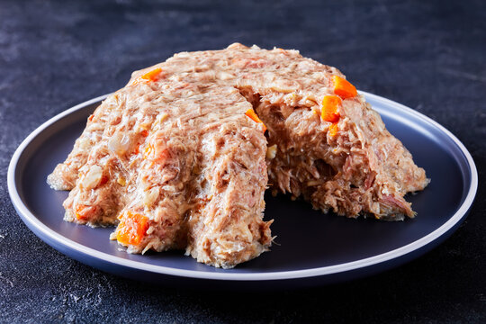 meat aspic, jellied slow cooked meat on a plate