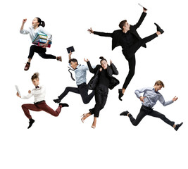 Male and female office workers jumping and dancing in casual and business style clothes with folders, coffee, tablet on white background. Ballet dancers. Set