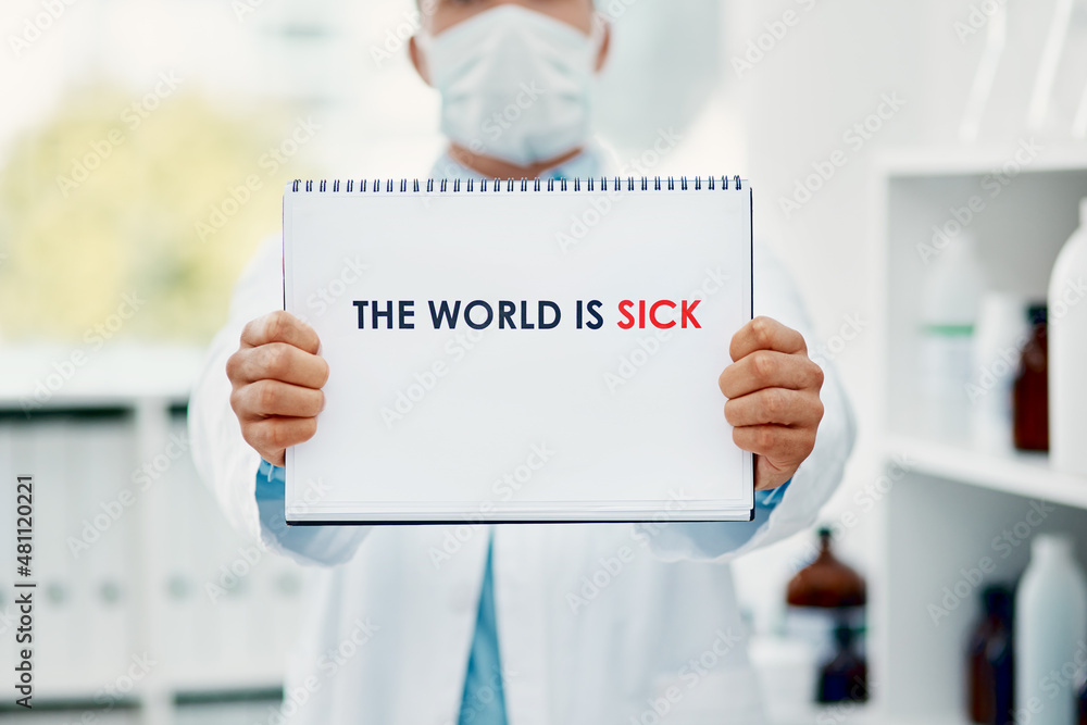 Poster The world is not well. Shot of a scientist holding a sign with The world is sick on it in a laboratory.