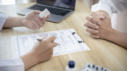 Medical consultation, Doctors advise and give advice..medicines are given to patients in the examination room of a hospital or clinic, Diagnosis, Medical service, Healthy lifestyle concept...