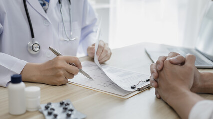 Specialist doctor took a history to ask about the symptoms of patients who were admitted to the...
