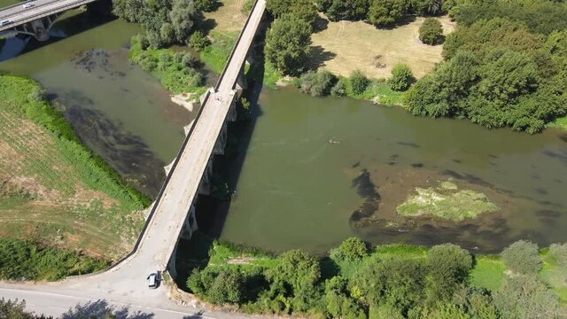Aerial view of Nineteenth-century bridge over the Yantra River, known as the Kolyu Ficheto Bridge in Byala, Ruse region, Bulgaria
