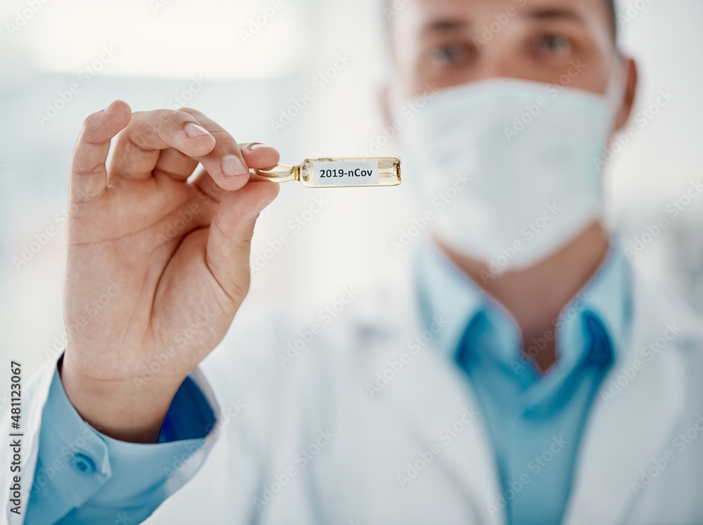 Poster get ready to get cured. cropped shot of a scientist holding an ampoule with 2019-ncov on it.