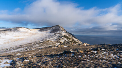 landscape in winter with snow and lake