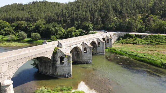 Aerial view of Nineteenth-century bridge over the Yantra River, known as the Kolyu Ficheto Bridge in Byala, Ruse region, Bulgaria