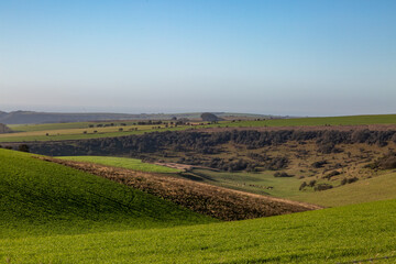 Fototapeta na wymiar A rolling green South Downs landscape viewed from Ditchling Beacon