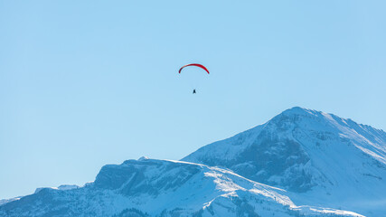 Flight of a paraglider in Interlaken in Switzerland on November 17th 2021
