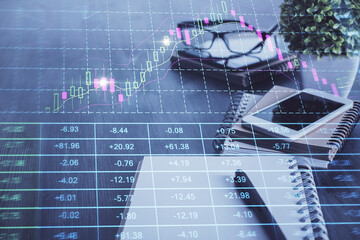 Double exposure of forex chart drawing and cell phone background. Concept of financial trading
