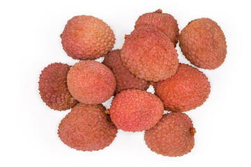 Top view of whole ripe lychee fruits on white background