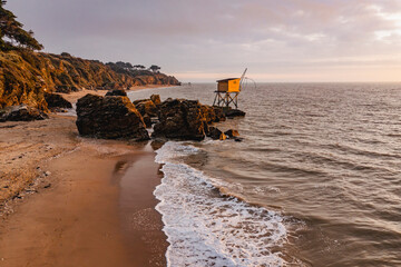 .French oceanfront landscape, oceanfront fish cabins in France.