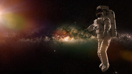 Fototapeta na wymiar astronaut in empty space, spaceman flying free 