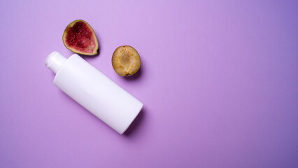 shampoo or hair conditioner bottle on blue background