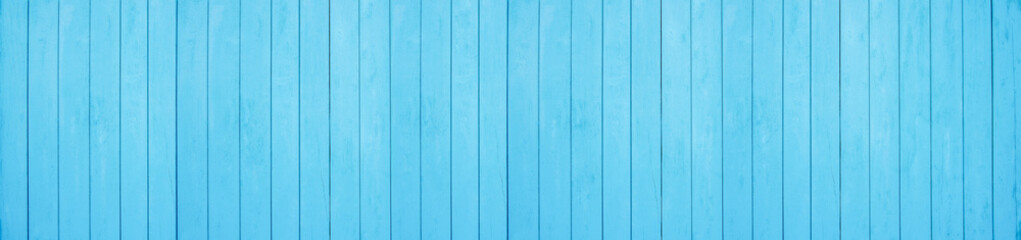 Fototapeta na wymiar Old weathered wooden plank painted in turquoise blue color. Vintage beach wood background.