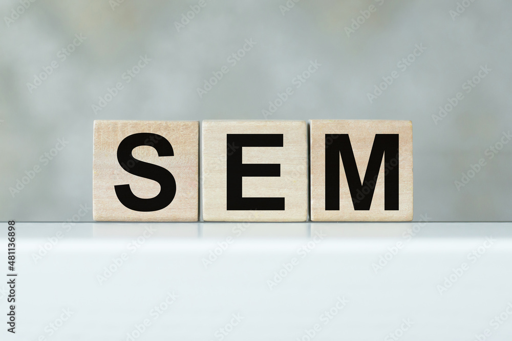 Aufkleber seo search engine optimization text wooden cube blocks on table background.