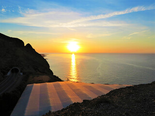 Sunrise over the Mediterranean and Greenhouse.