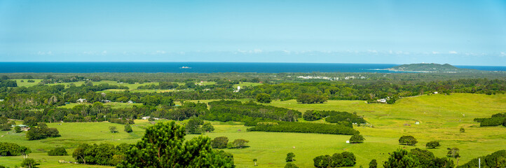 Scenic view towards the coast line with Byron Bay lighthouse in the background, NSW, Australia