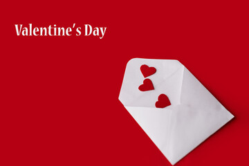 postal envelope with valentines on a red background.